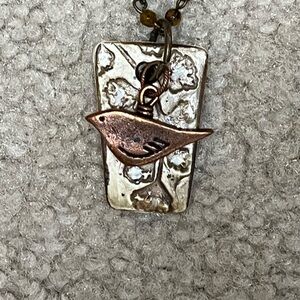 Elegant Beaded Necklace with Pottery pendant added copper bird accents